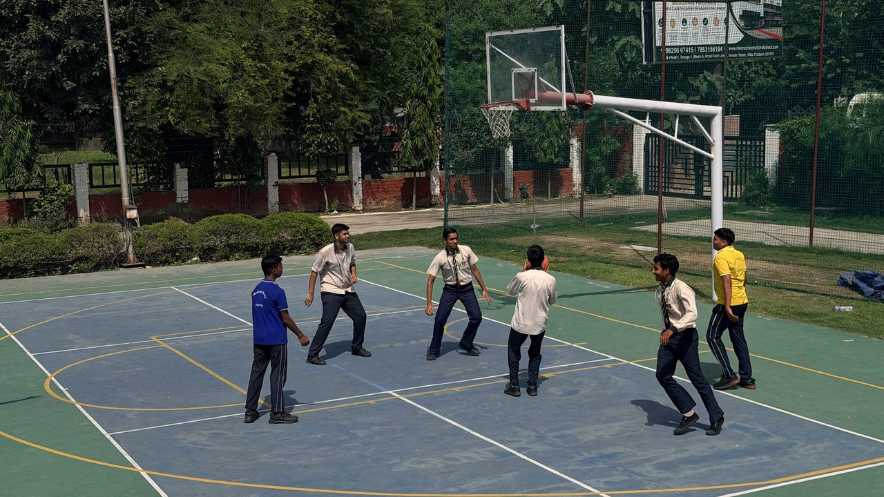 Students playing basketball at Sheoran International School