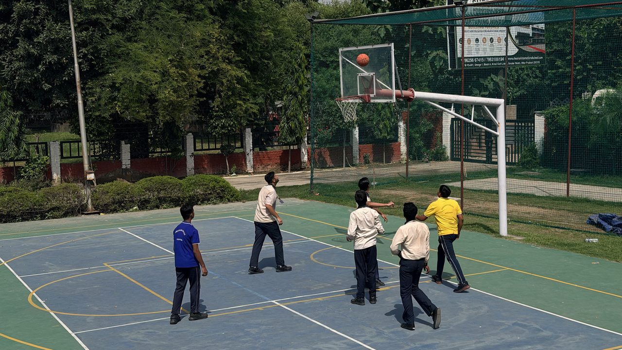 Students playing basketball