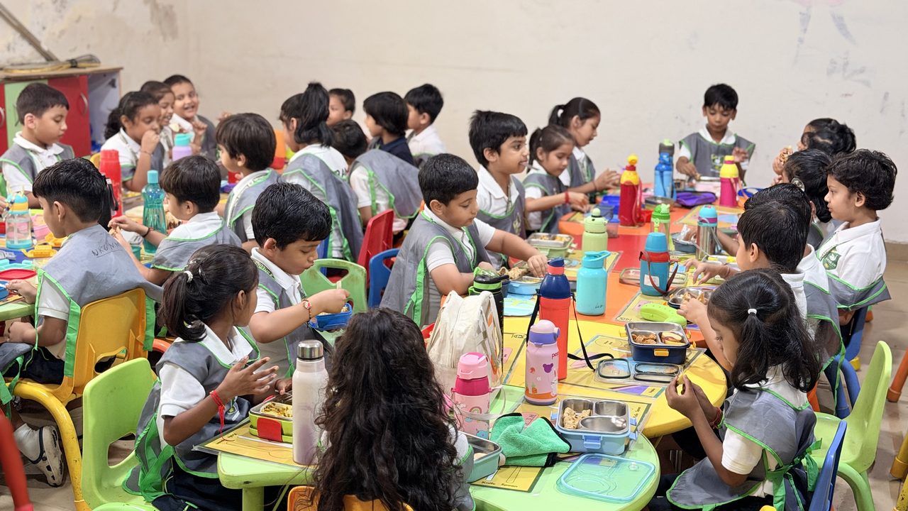 Day boarding children having lunch together